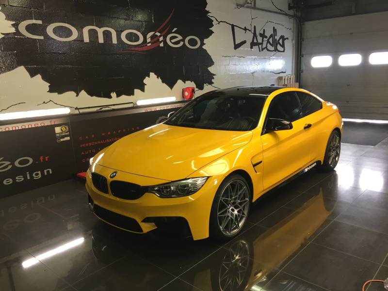 Covering complet sur une BMW M4 en jaune brillant réalisation par Comonéo à Mundolsheim près de Strasbourg en Alsace